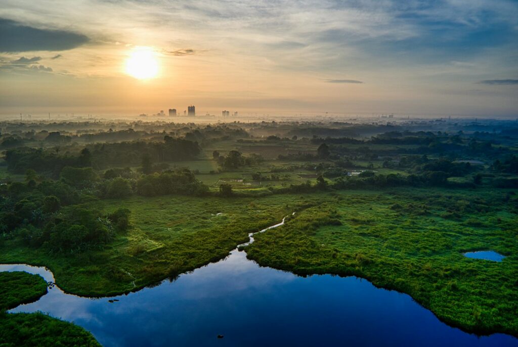 aerial photography of landscape with view of sunset